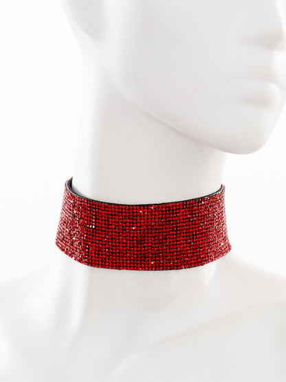 Radiate confidence with the dazzling red crystal-covered choker, tailored to enhance your style and accentuate your neckline.