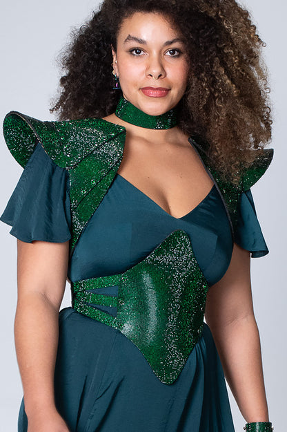 Statement cropped jacket crafted from luxurious emerald green crystal material, ideal for making a bold fashion statement
