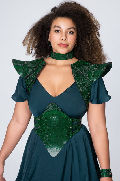 Chic short jacket with a modern twist, made from luxurious emerald green crystal fabric