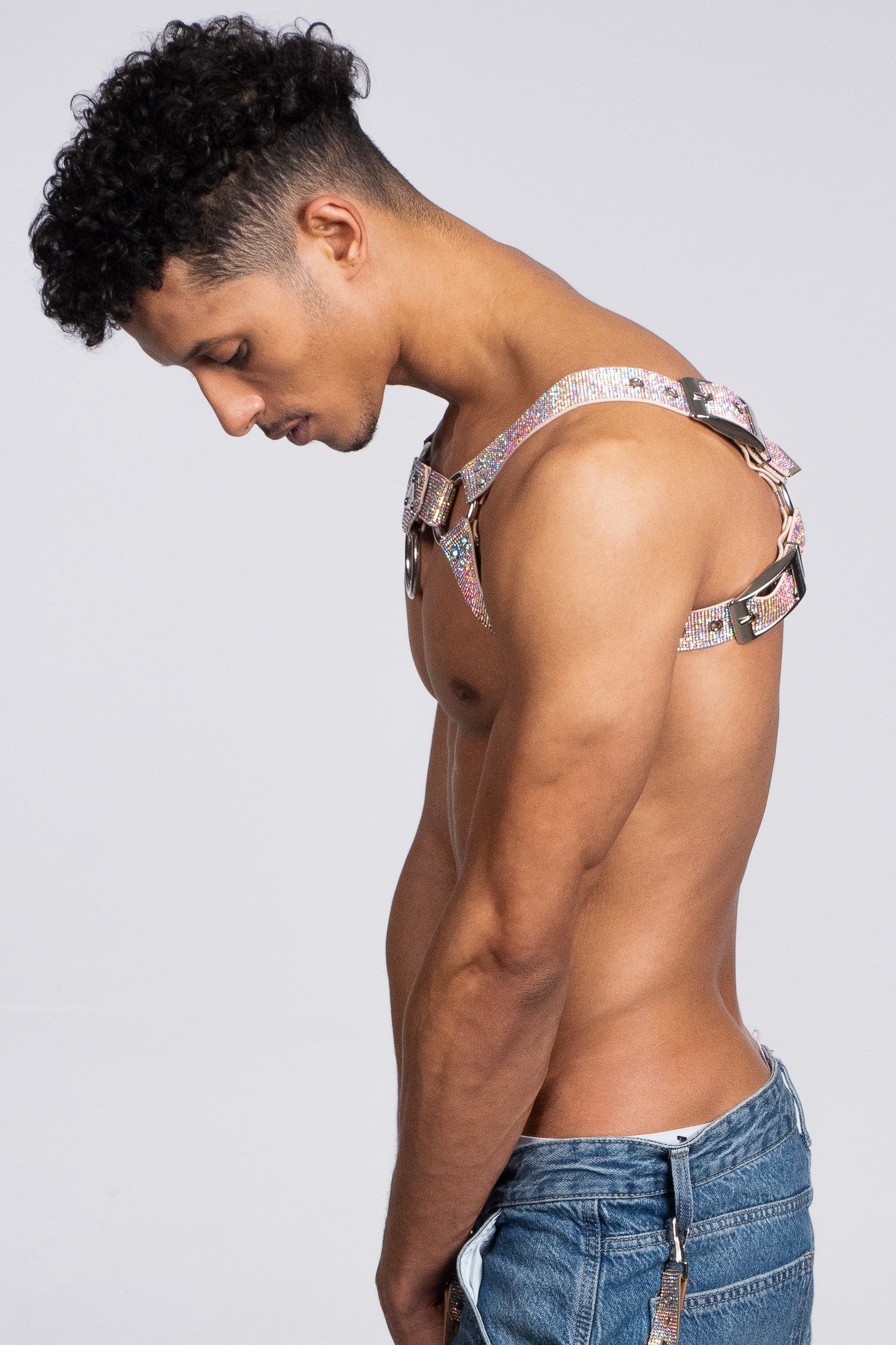 Dazzling multicolored crystal-covered H-Harness, a must-have accessory for confident and stylish individuals at LGBTQ+ events.