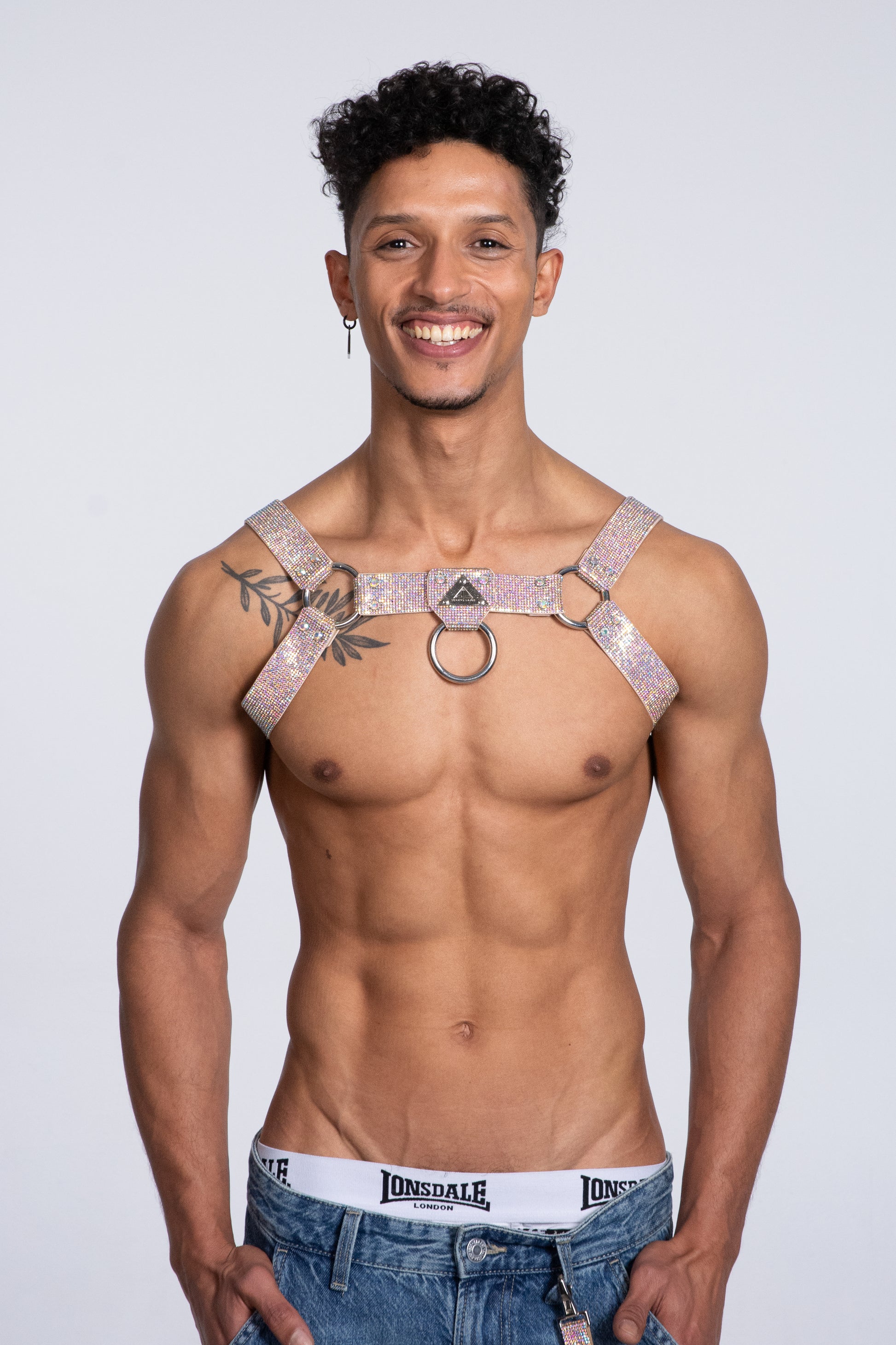 Multicolored crystal-adorned H-Harness for vibrant and stylish men at gay parties.