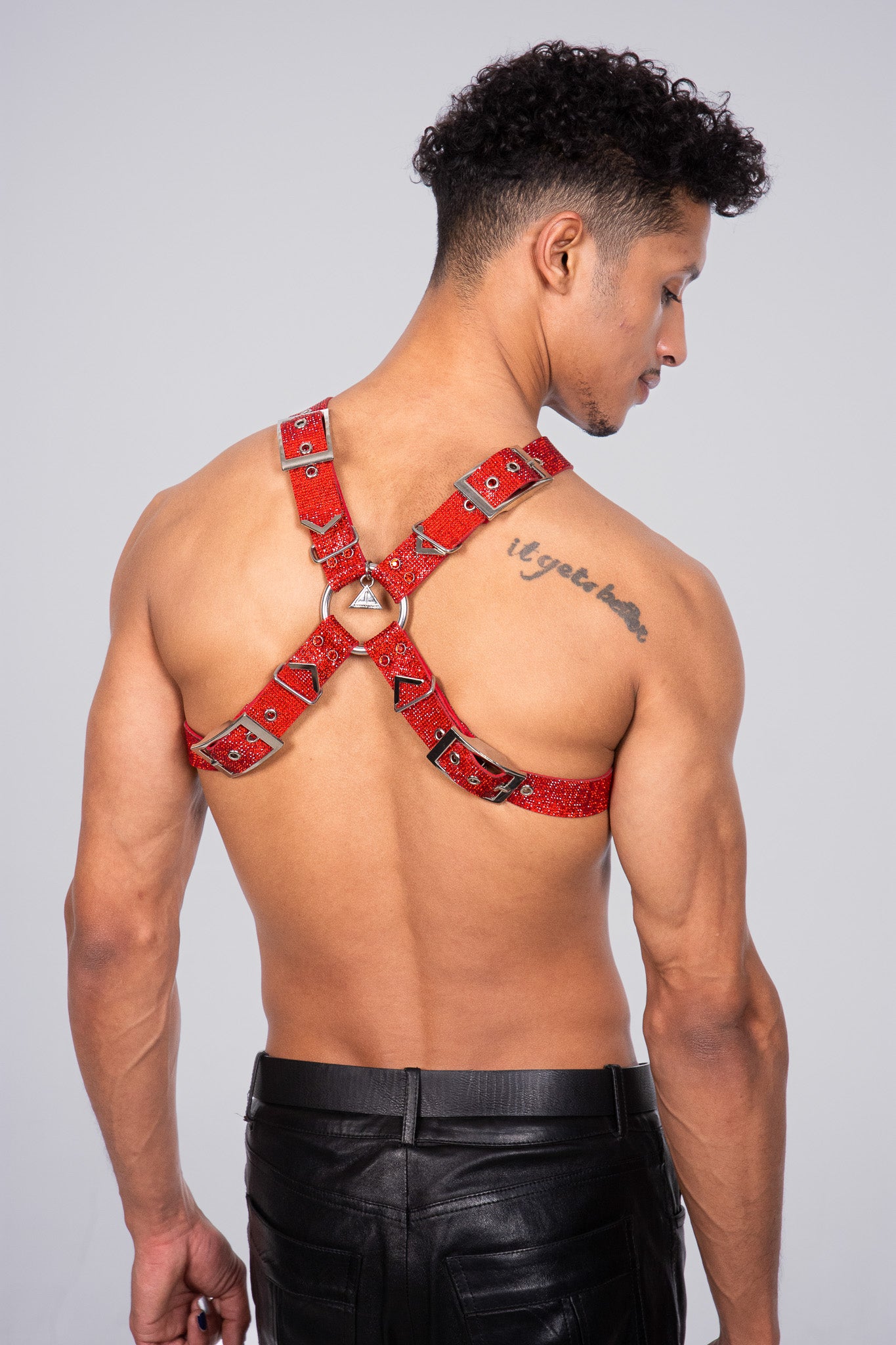 Striking red crystal X-Harness designed to command attention and showcase your individuality at gay nightlife events.