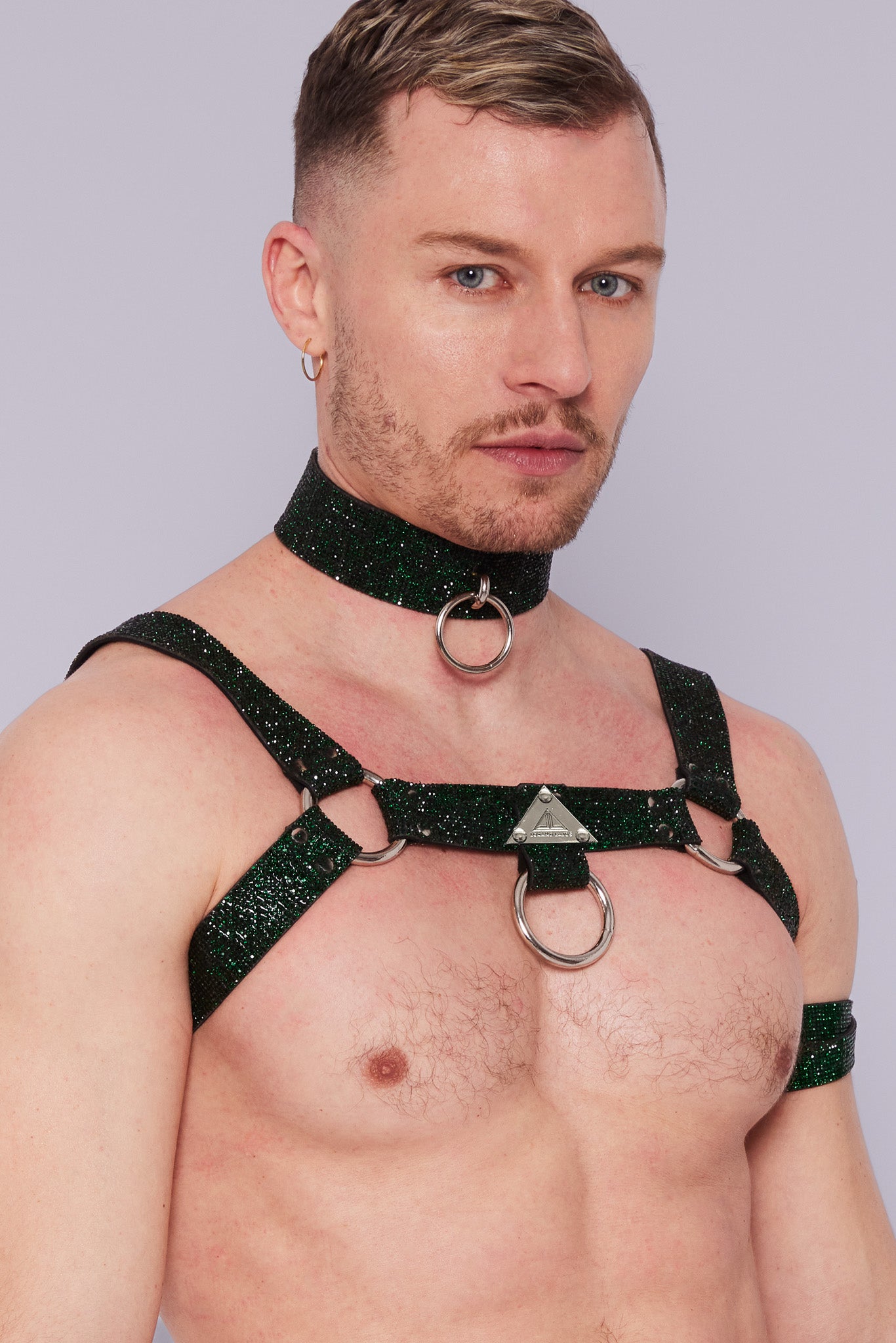 Luxurious emerald green crystal H-Harness, adding a touch of opulence and glamour to your ensemble at gay nightlife events.