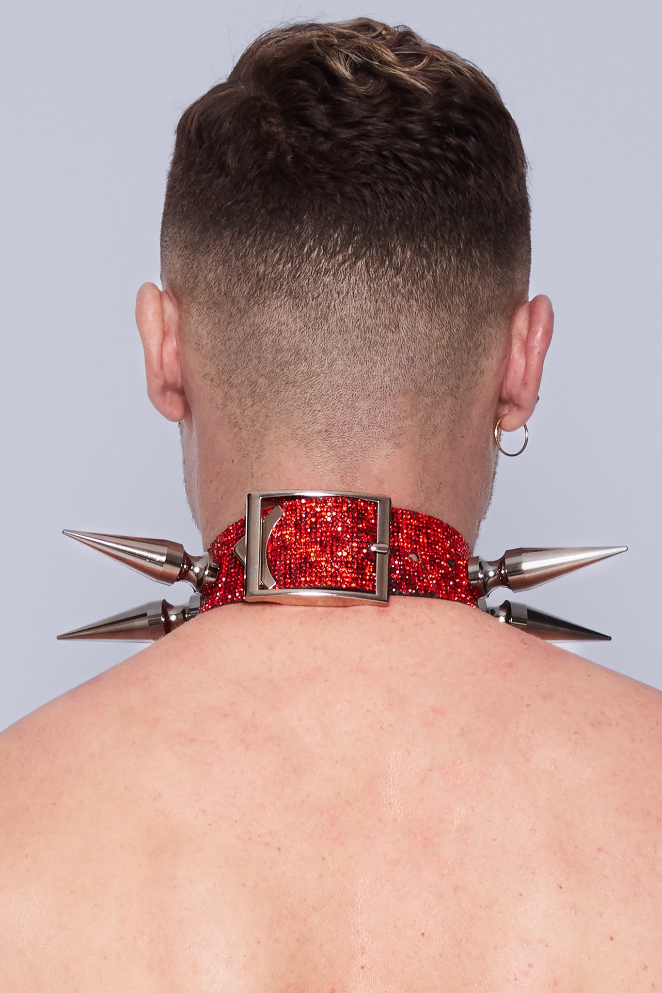 Glamorous red sparkly stud choker with daring 8cm long studs for a punk-inspired look