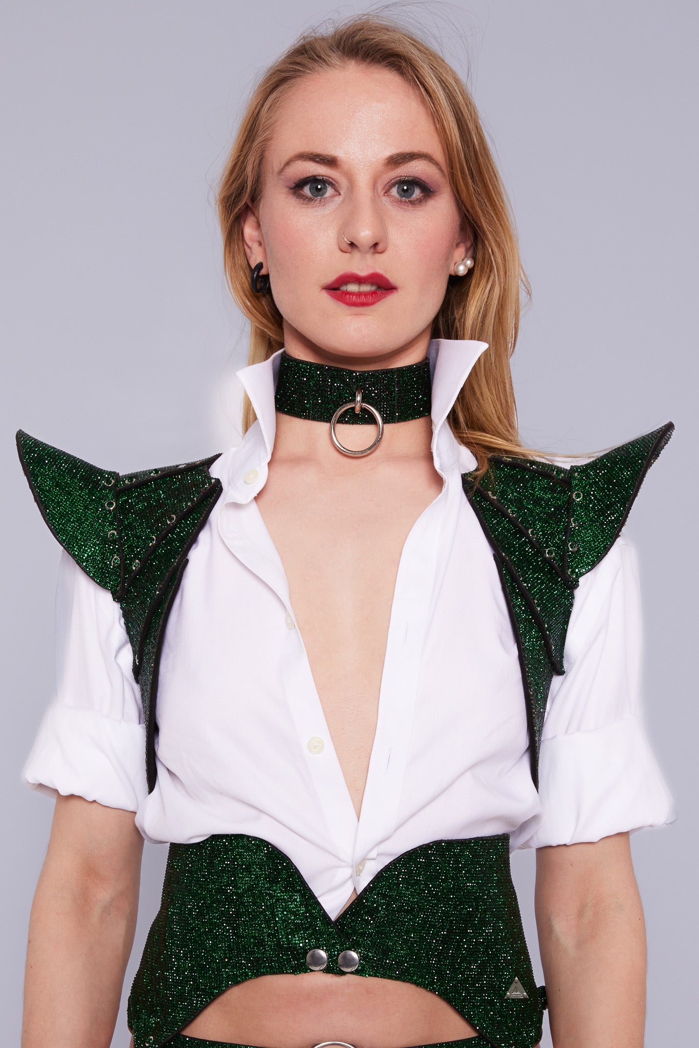 Radiant PAGODA Jacket featuring shimmering emerald green crystals, adding a touch of sparkle to your look