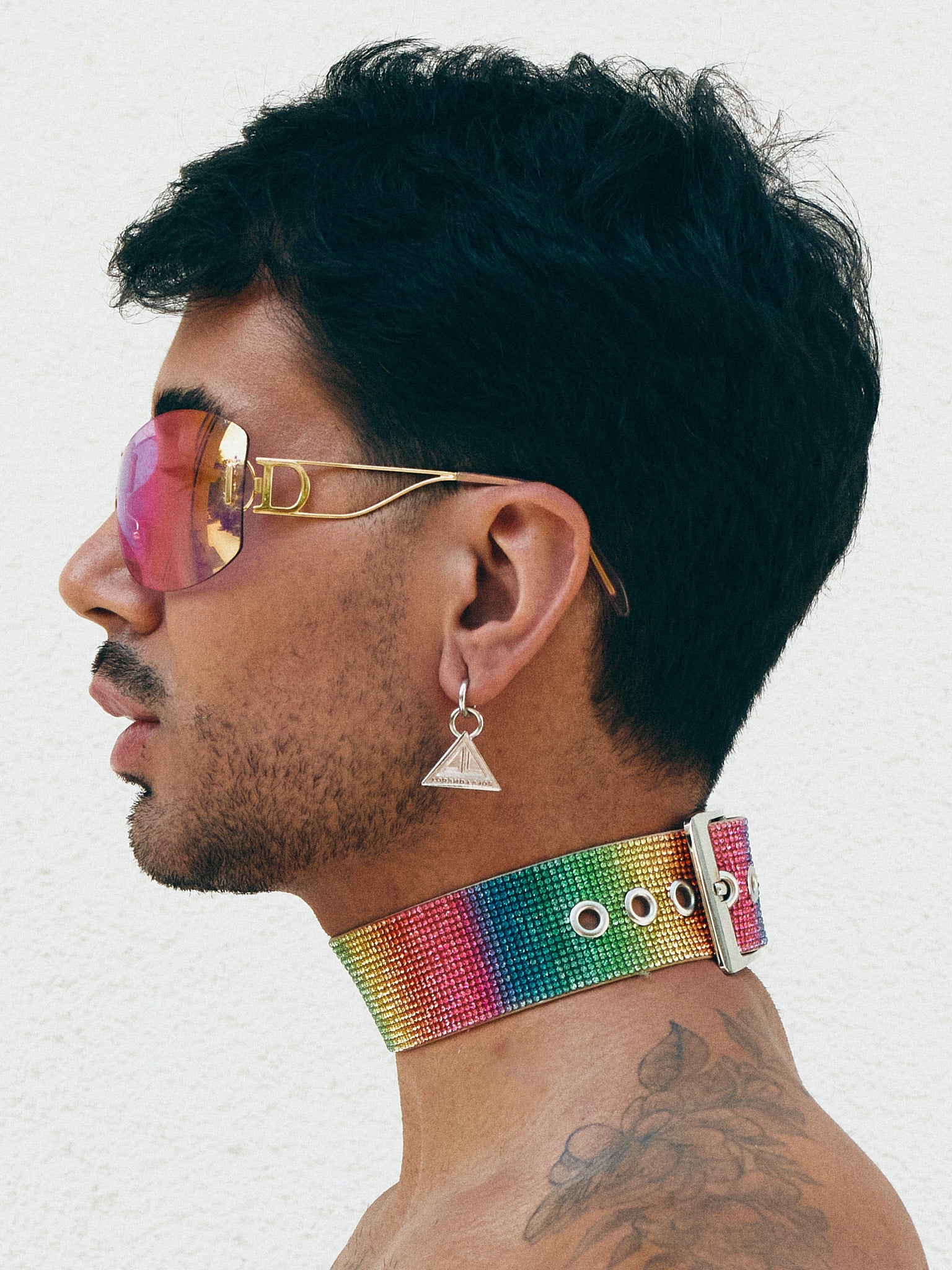 picture for our crystal rainbow pride choker with ring by Lorand Lajos backside with shiny buckle as well as earring with logo.