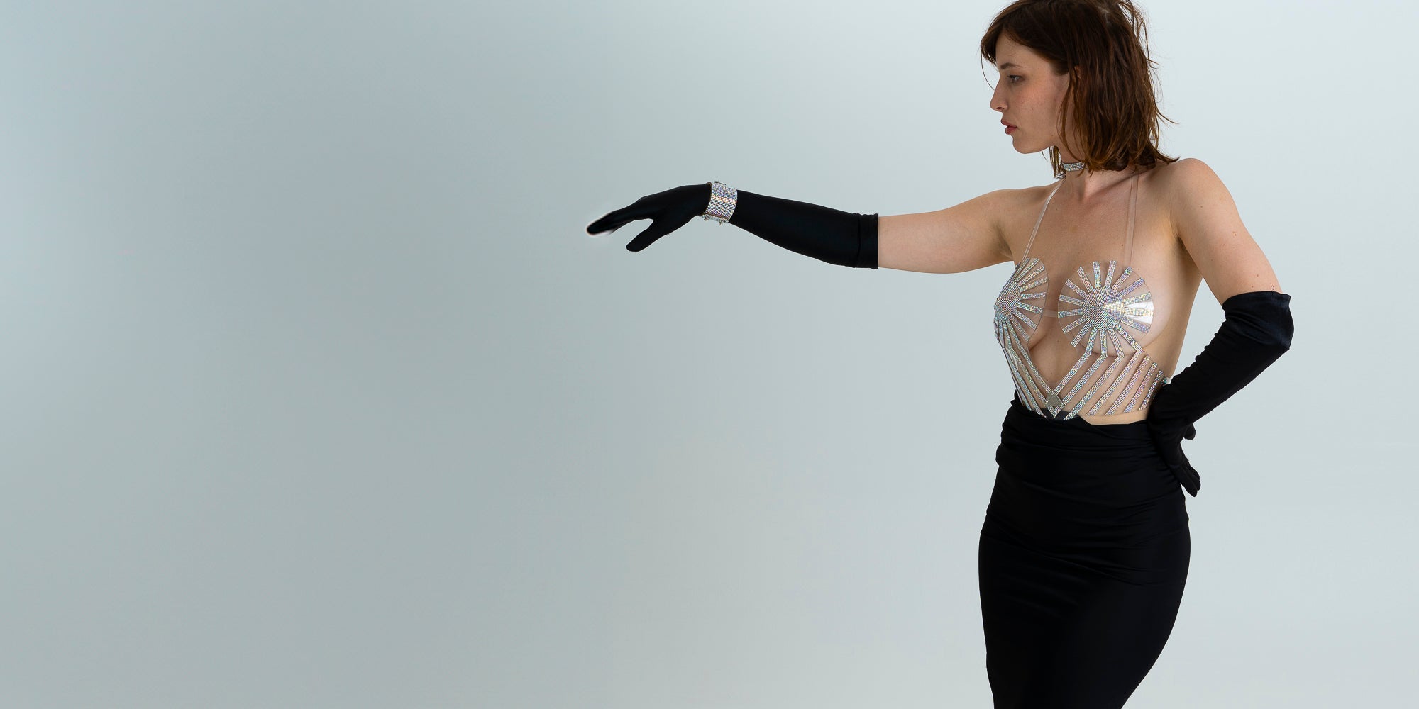 beautiful women in elegant evening dress with a crystal bra by Lorand Lajos